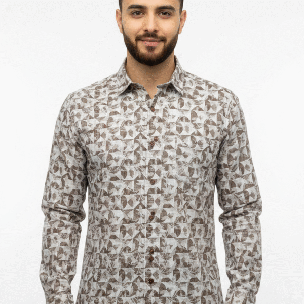 Indian male model wearing a premium black full-sleeve shirt with chest pocket, standing in studio background