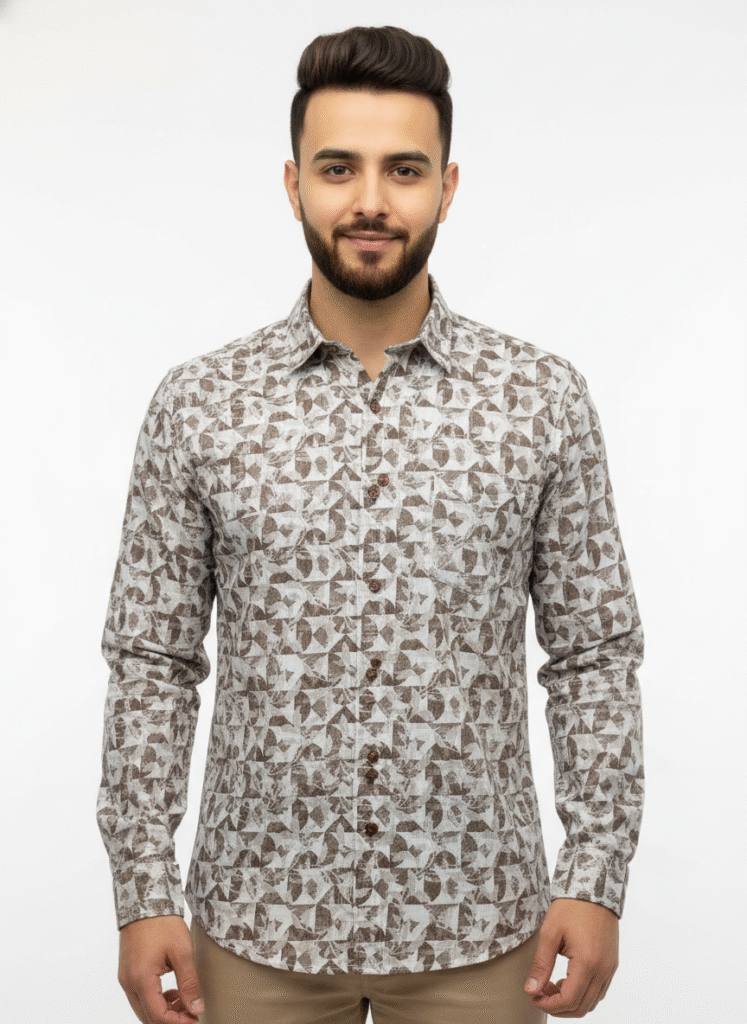 Indian male model wearing a premium black full-sleeve shirt with chest pocket, standing in studio background