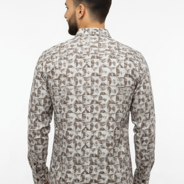 Indian male model wearing a premium black full-sleeve shirt with chest pocket, standing in studio background